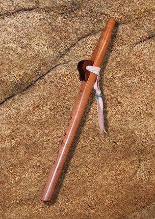 Photo of A Backpacker Native American Style Flutes